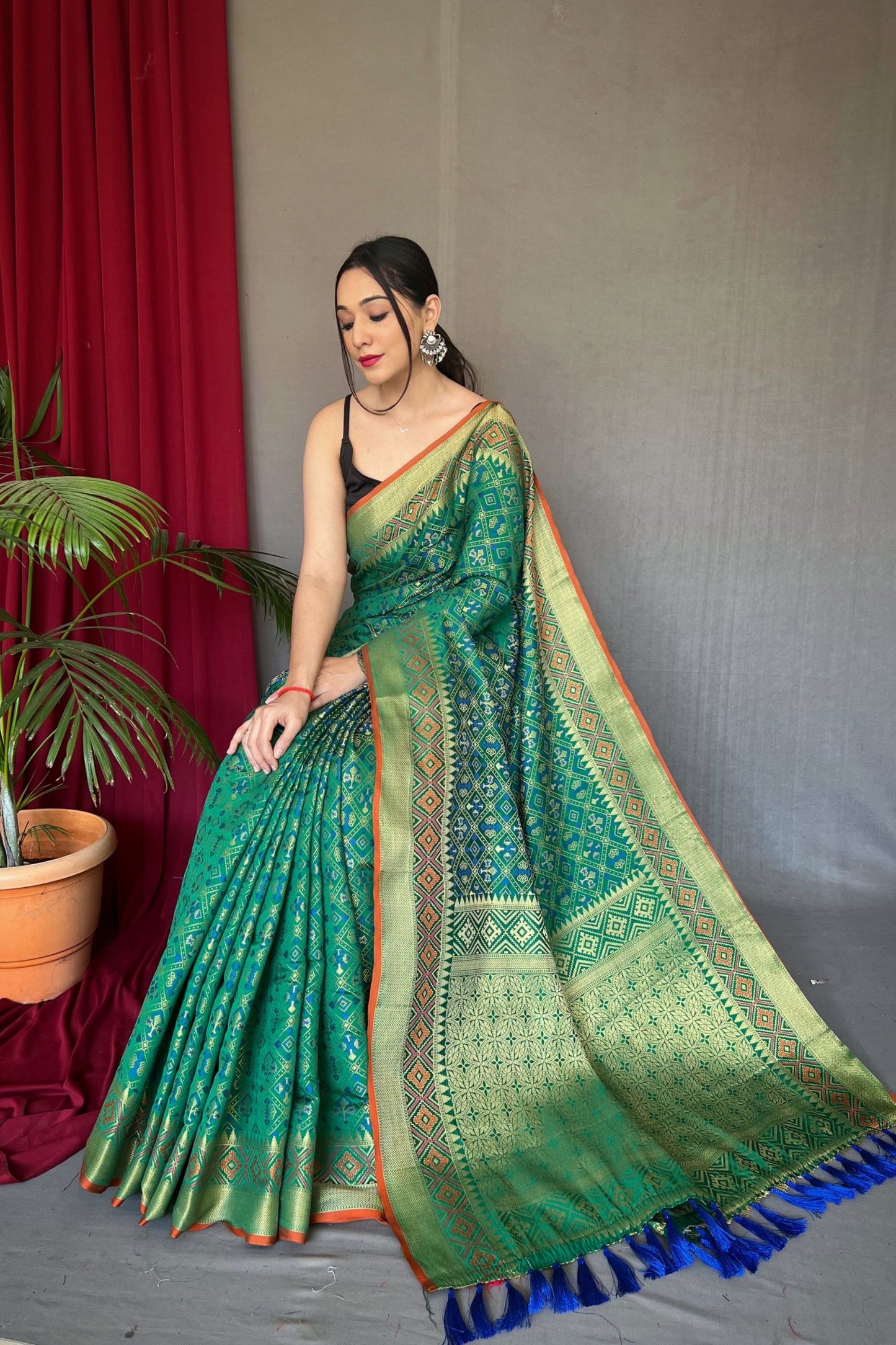 Aqua Green Meenakari Zari Weaving Patola Silk Saree