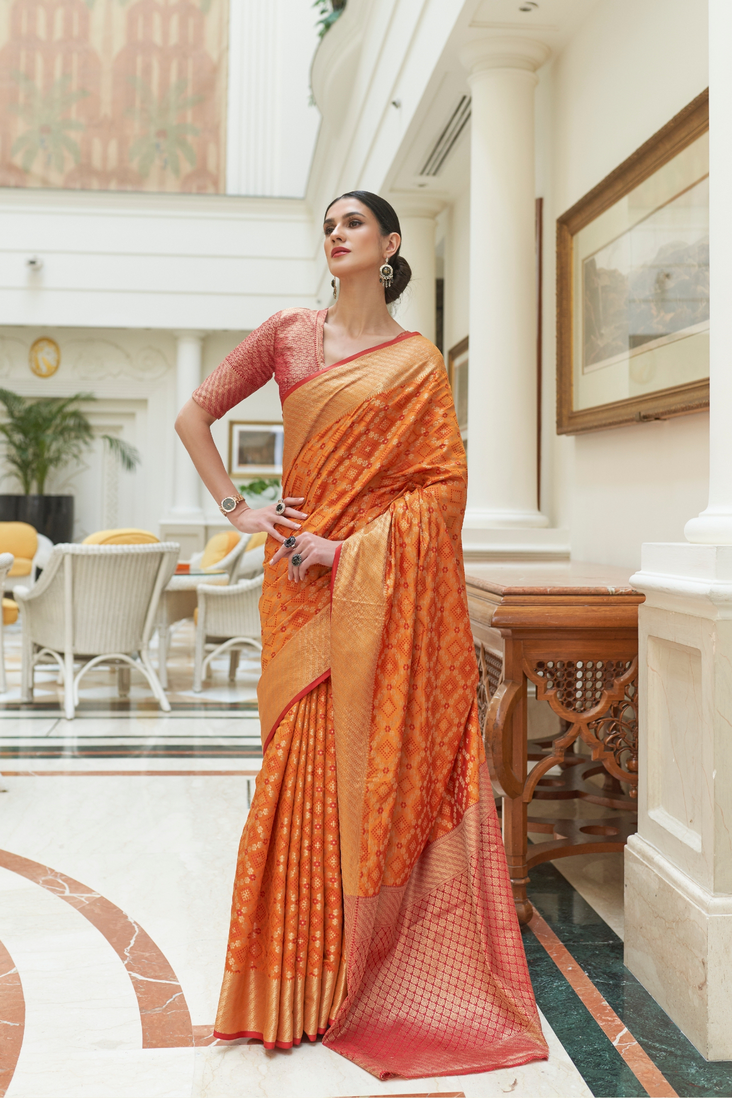 Yam Orange Exquisite Patola Silk Saree with Handloom Weaving