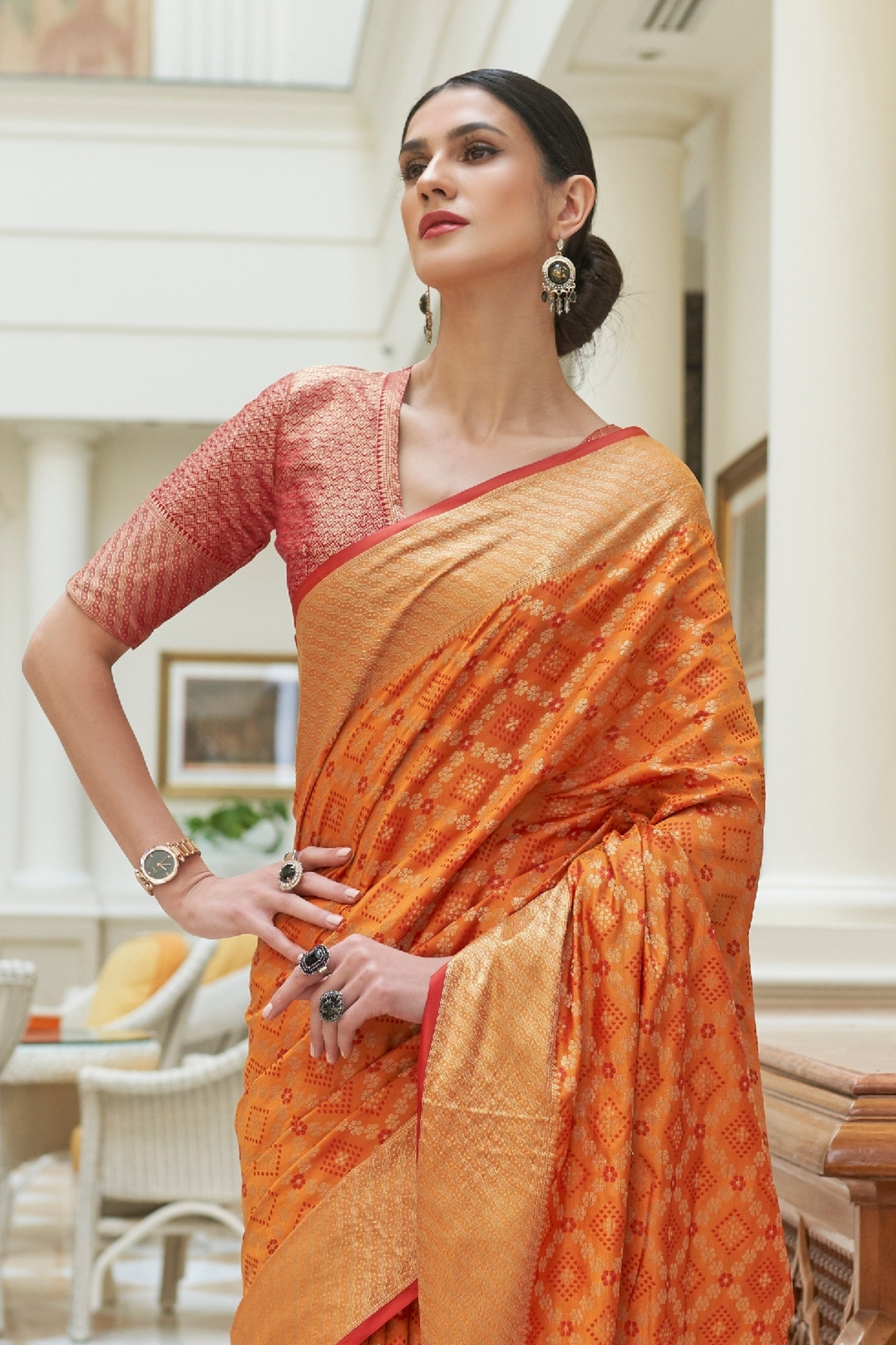 Yam Orange Exquisite Patola Silk Saree with Handloom Weaving