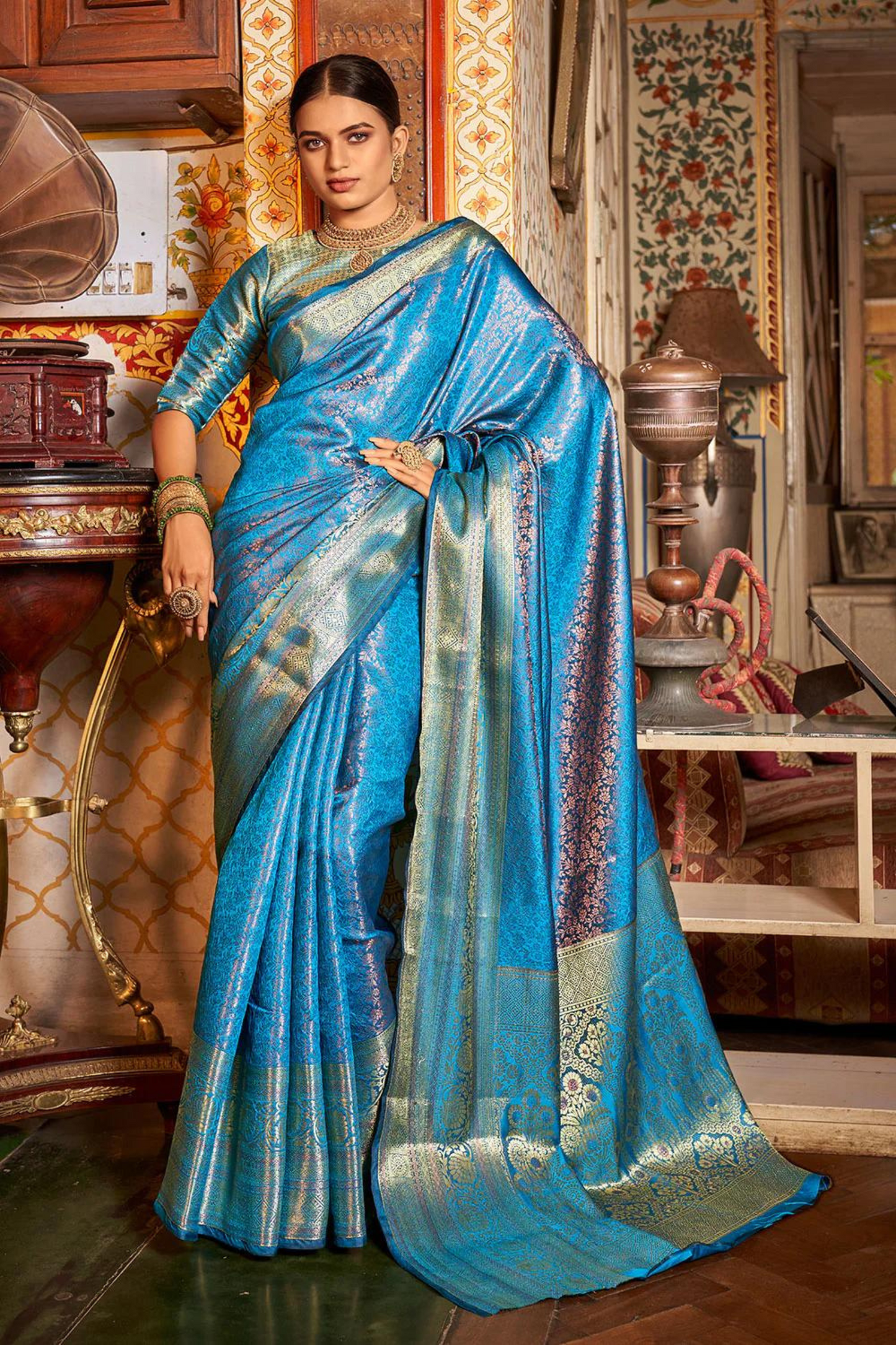 Teal Blue Pure Kanjivaram Silk with Bronze Zari Weaving