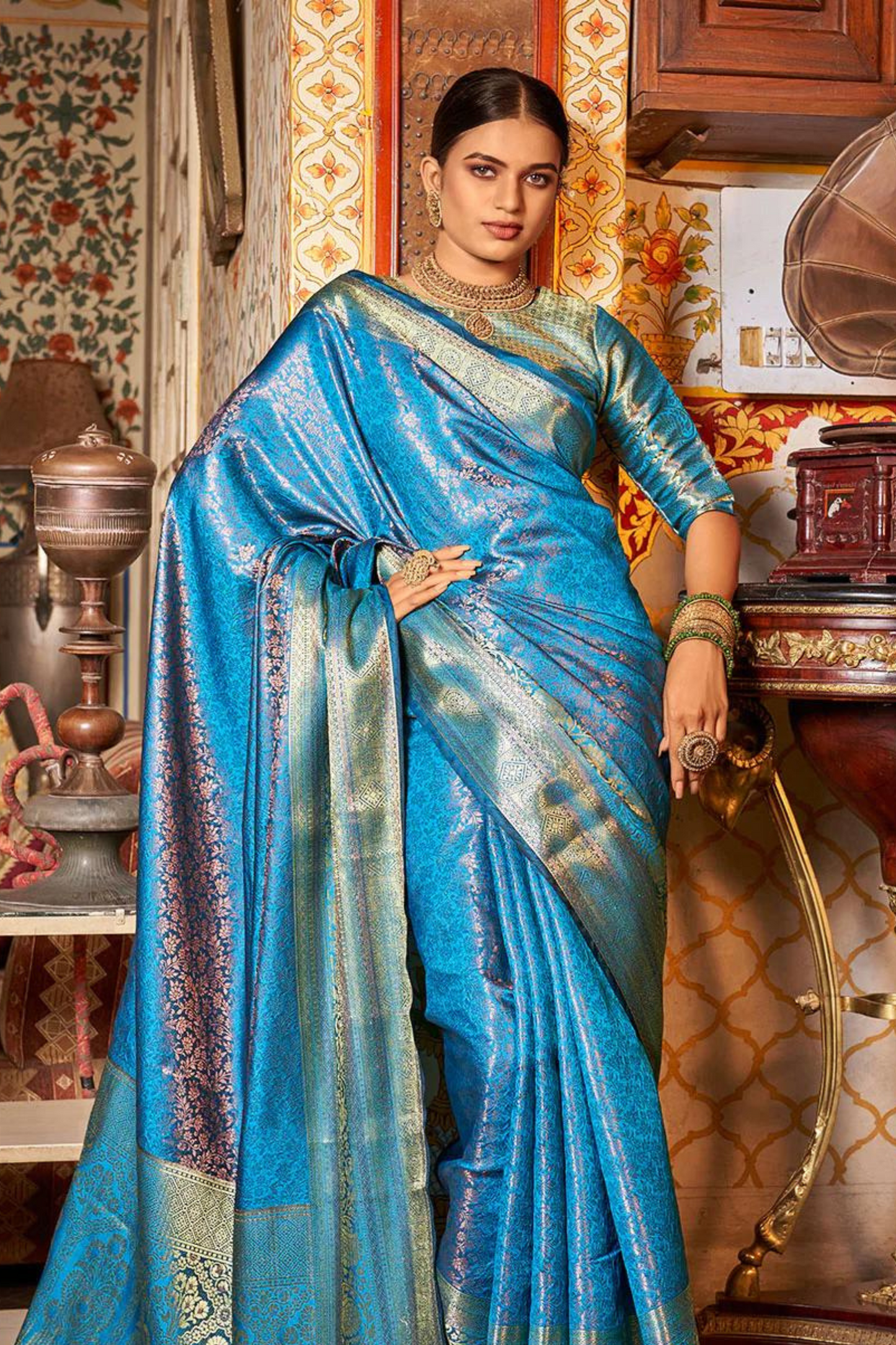 Teal Blue Pure Kanjivaram Silk with Bronze Zari Weaving